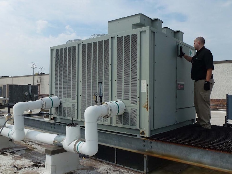 D and R technician working on commercial HVAC